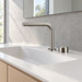 FILER brushed silver brass two-hole basin faucet — installed basin close-up