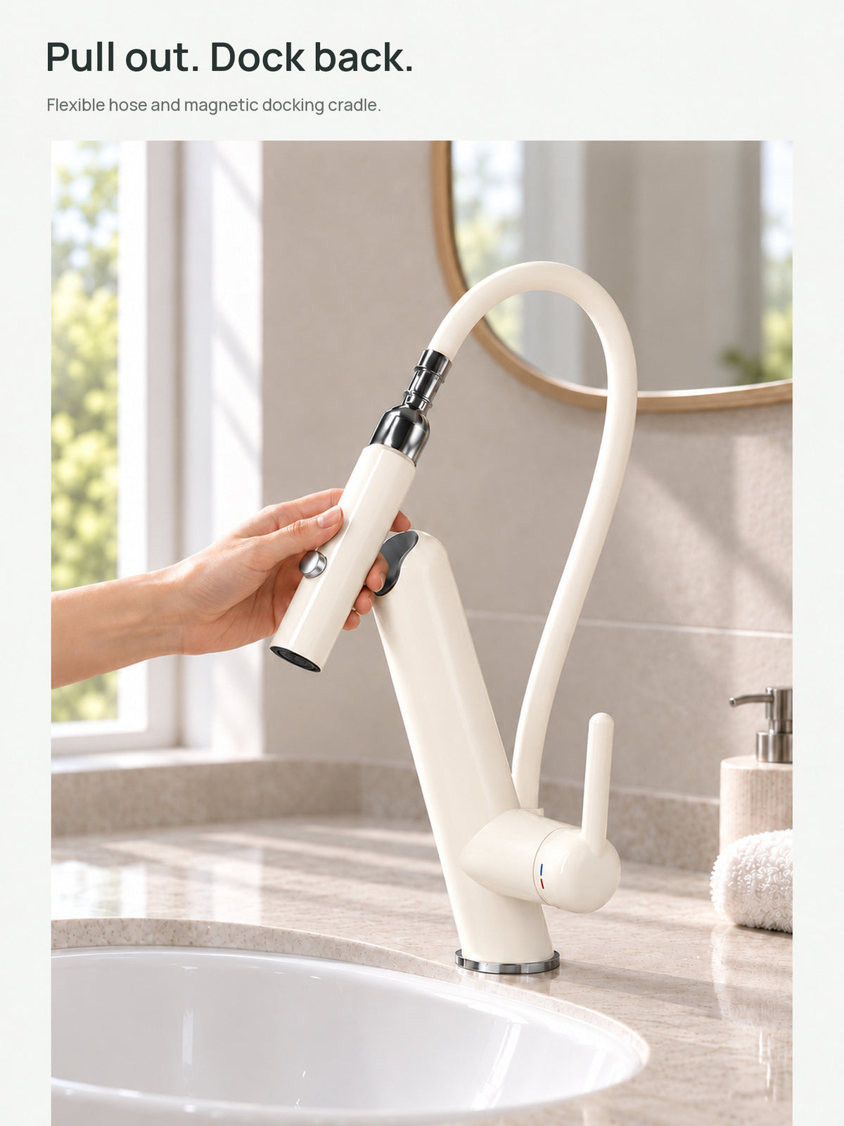 Pull-out spray head and magnetic cradle at a bathroom vanity