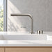 FILER brushed silver brass two-hole basin faucet — 360-degree swivel illustration