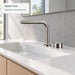 FILER brushed silver brass two-hole basin faucet — running-water scene with separate control