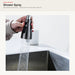 Pull-down kitchen faucet showing the shower-spray water mode