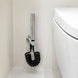 FILER rotary brass bidet sprayer with black coiled hose — installed bathroom scene
