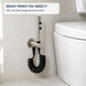 FILER push-button stainless steel bidet sprayer with black coiled hose — installed bathroom scene