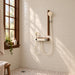 FILER cream and walnut-effect shower set — installed bathroom scene