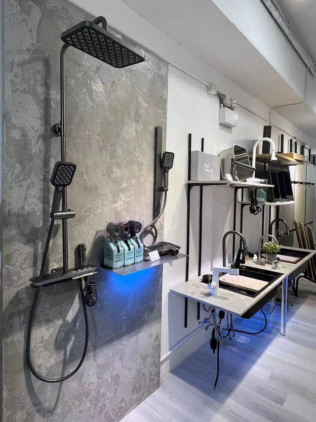 Shower fixtures and sinks displayed at the Hong Kong showroom